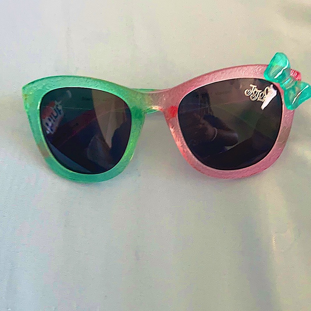 These are JoJo Siwa sunglasses it had a bow on it.